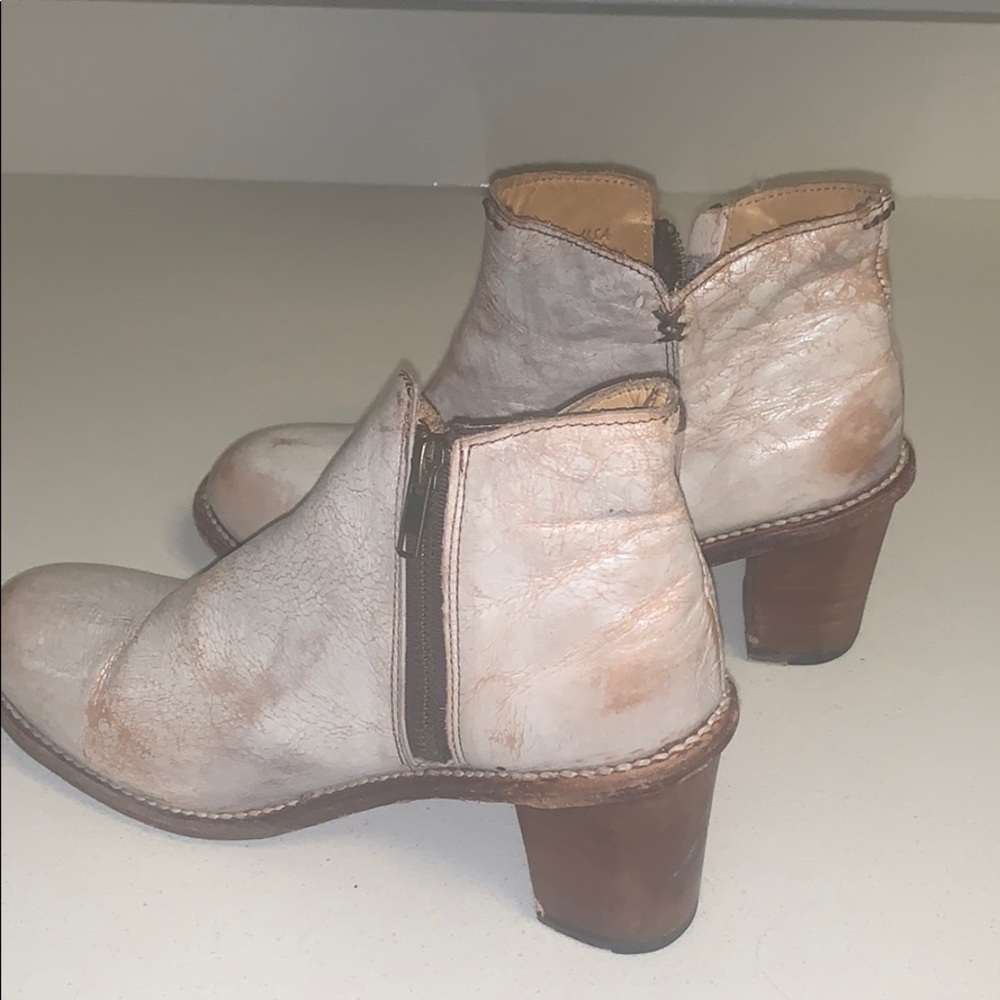White slight shimmer distressed booties